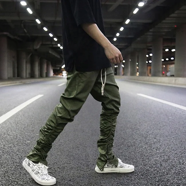 OEM fog trendy plain color draped stretch waist pants men stock slim fit ankle zipper jogger pants teen punk rap streetwear