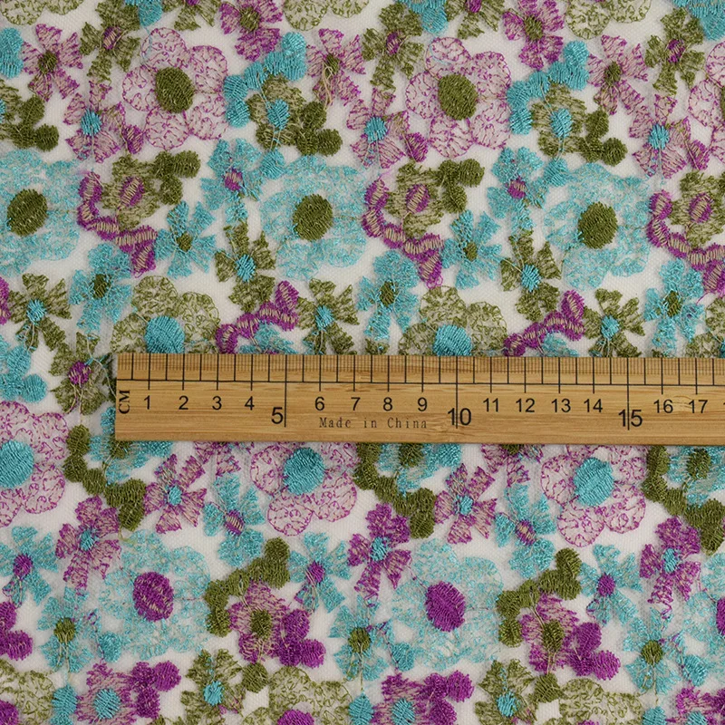 
Hot Sale Polyester Mesh Embroidery Small Sunflower Embroidered Tulle Fabric For clothing 