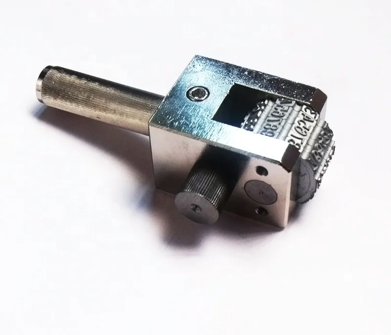 numbering head by hand press printing number on metal