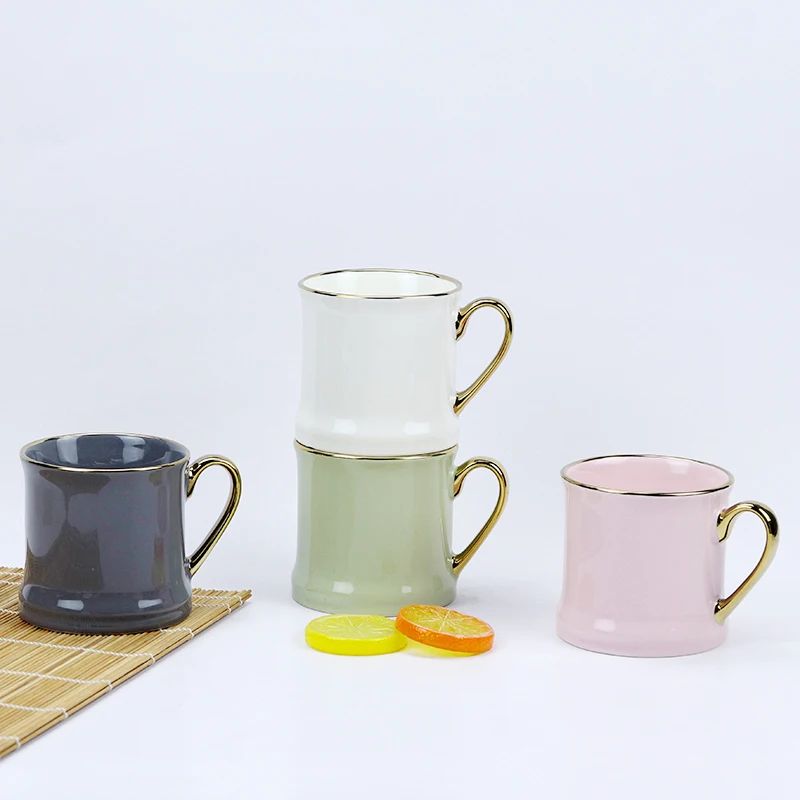 High quality Nordic design new bone china  embossed ball cup color glaze series golden rim and handle  coffee mug