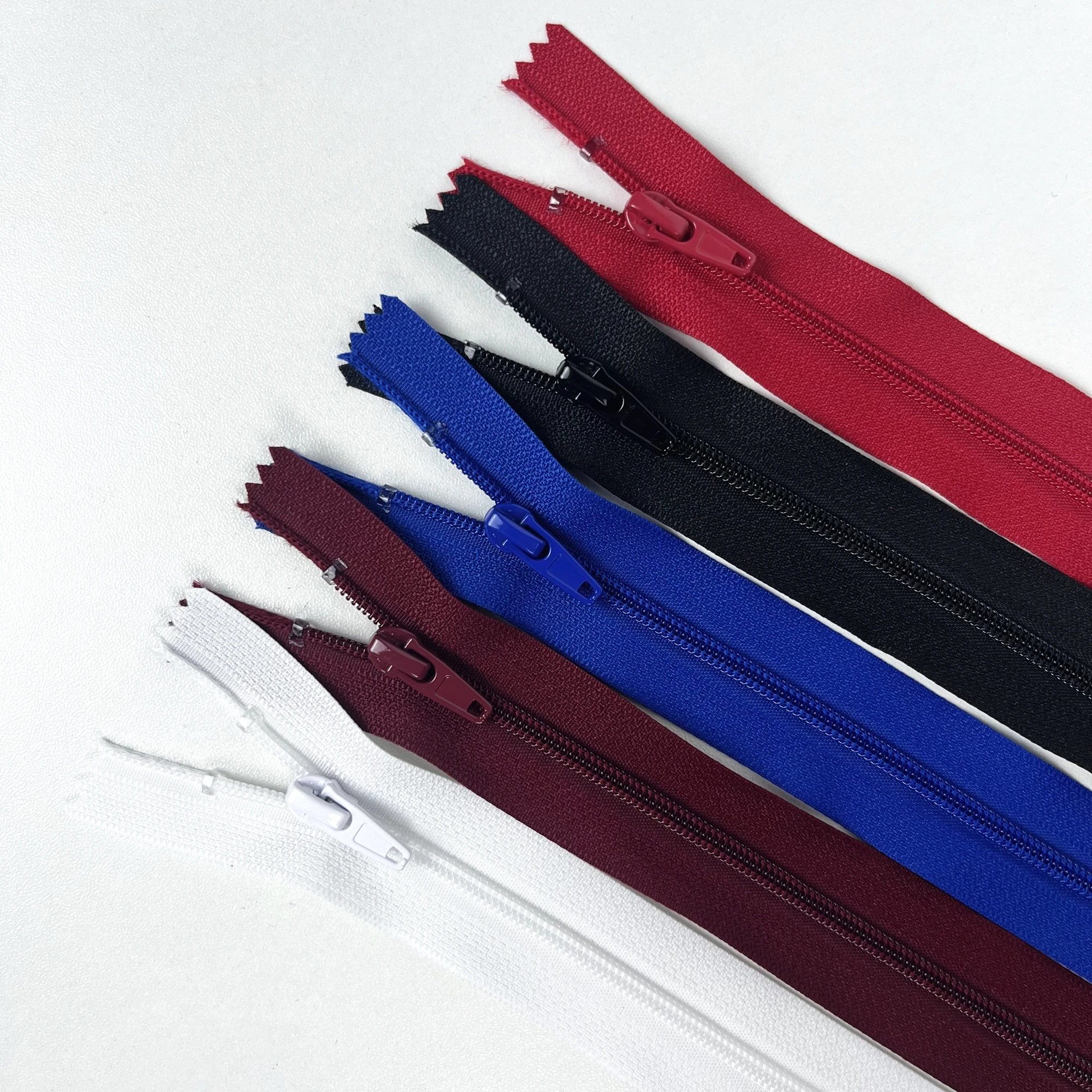 Jinhua Yiwu decorative metal invisible plastic zip custom logo close end nylon zipper pulls cursors sliders puller for bag