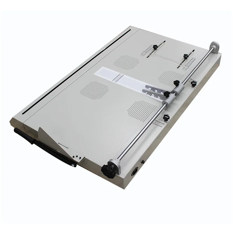 DC-100K hardcover book case machine accurately positions and forms hardcover with corner cutting and hemming