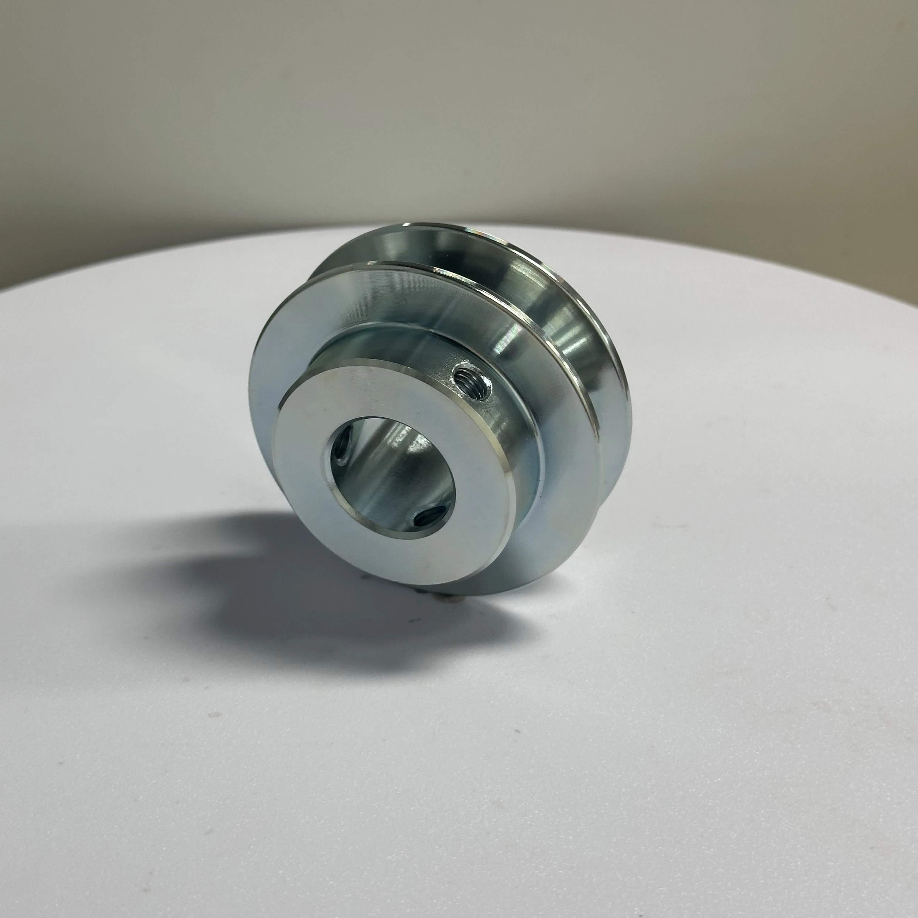 OEM/ODM Heavy Load High Quality Wear-resistant C45 Steel Zinc Plated Timing Belt Pulley without Teeth