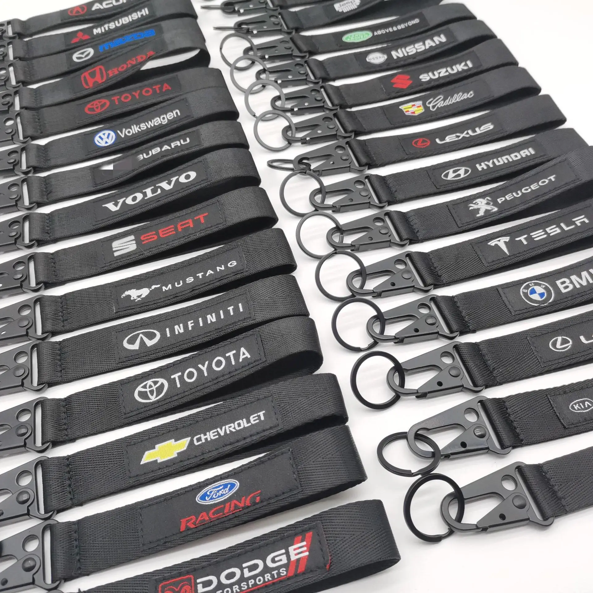 Black car logo embroidery, computer embroidery, car stitching, eagle mouth buckle, keychain, wrist strap, rope, and security key