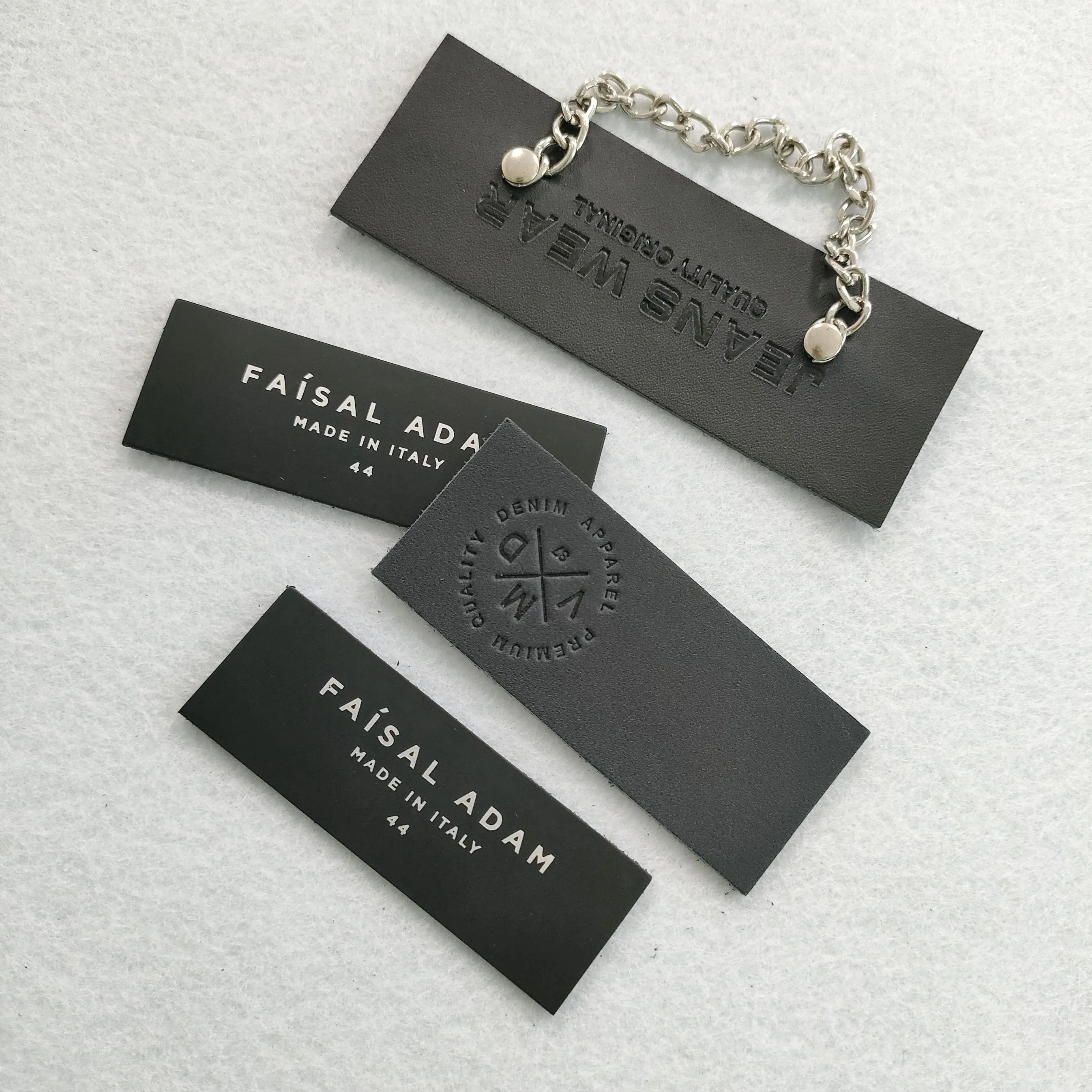 Factory custom black genuine leather embossed printed chain leather label