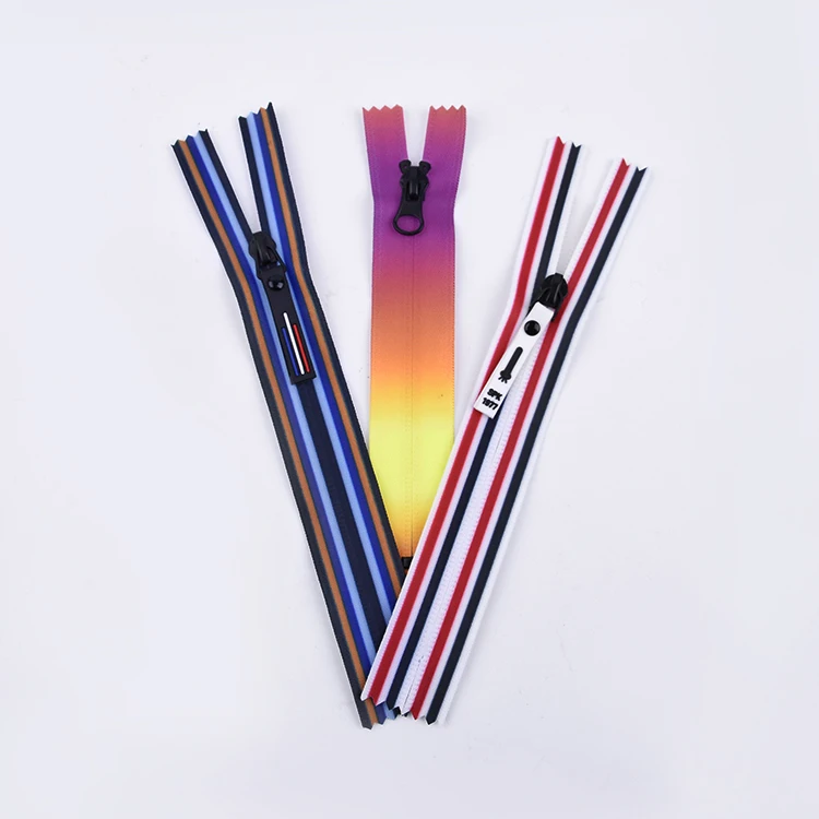 Wholesale #3 #5 Nylon Designer Zippers Invisible Reversible Slider With Fancy Tape Long Chain Nylon Zipper Roll Manufacturers