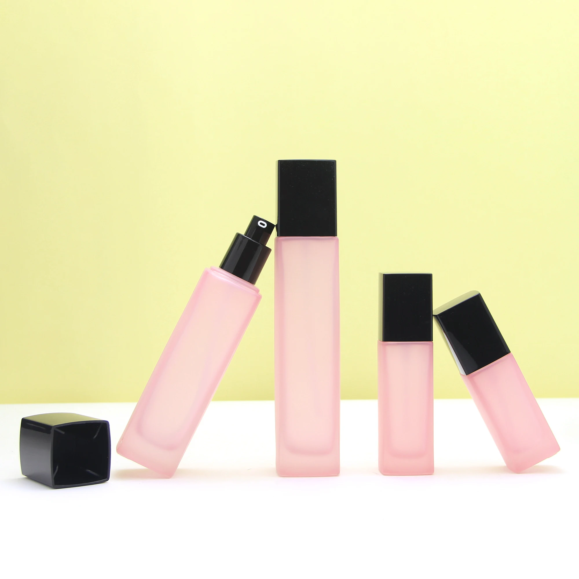 Wholesale cosmetic packaging set square matte pink empty body oil serum pump bottle and glass jars with lids