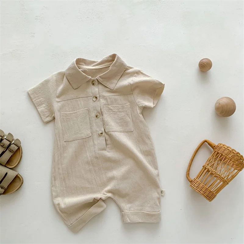 wholesale accept custom summer solid breathable jumpsuit newborn button front short sleeve baby cotton romper with pockets