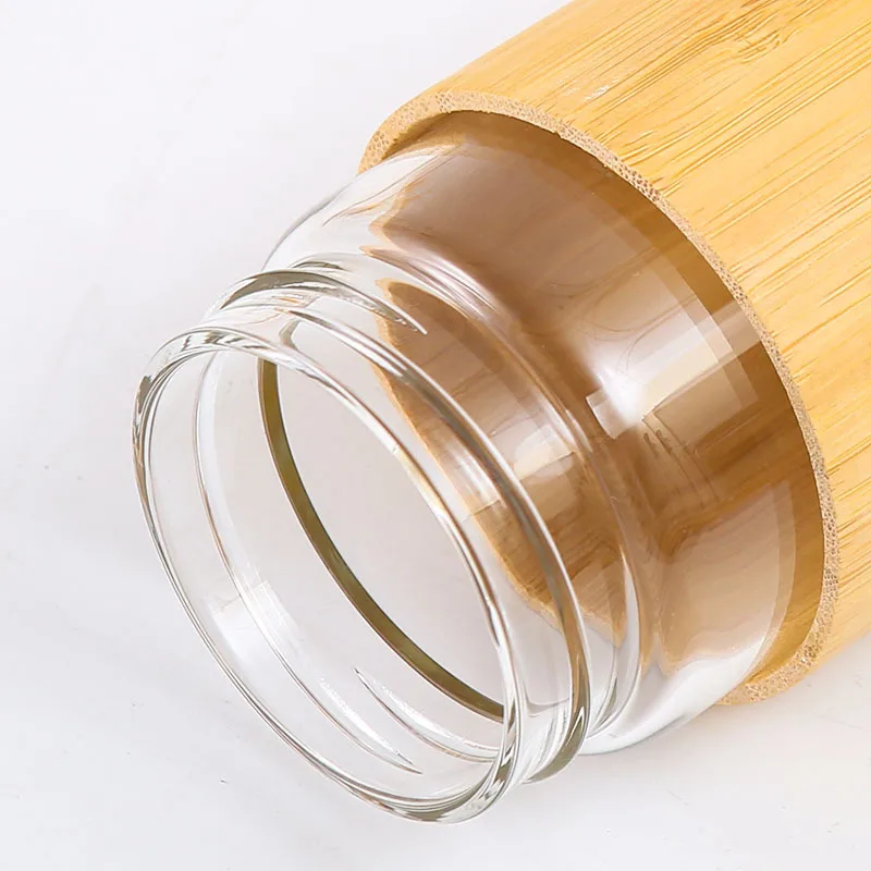 550ml  Laser Engraved Customized High Borosilicate Glass Sports Water Bottle with Portable Rope and Bamboo Exterior