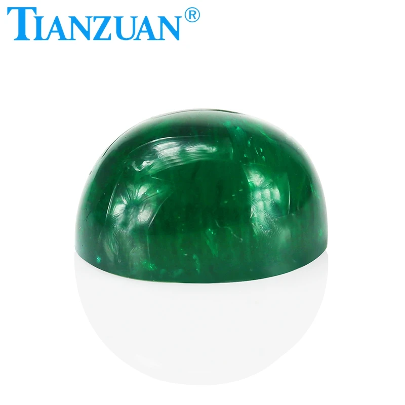 Oval shape flat back cabochon Hydrothermal emerald green color including minor cracks inclusions loose gem stone