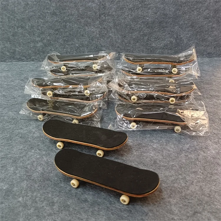 Custom finished product wooden fingerboard deck complete with truck and upgraded CNC bearing wheels