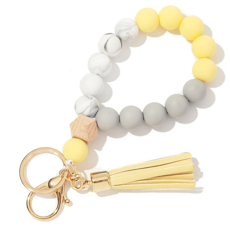 2023 Wholesale New Food Grade Silicone Beads Keychain Bracelet Wooden Bead Key Ring Wristlet With PU Tassel