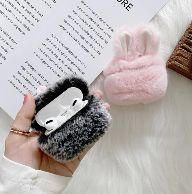 Plush rabbit ears are protected by airpods pro2 headphones headphone case