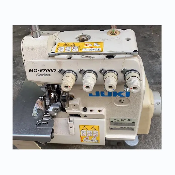 SecondHand Original Jukis 6714 Overlock Machine 4-Thread High-Speed Overlock Machine For Sewing Outerwear Sweatshirts