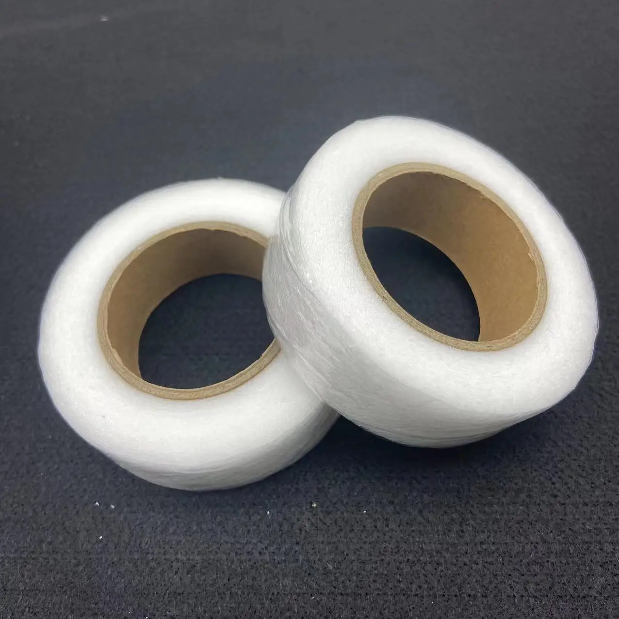 Hot Sale 1cm 1.2cm 1.5cm 2cm 3cm Iron-on Hemming Tapes Fusible Bonding Garment Accessories Black/White hemming web tape