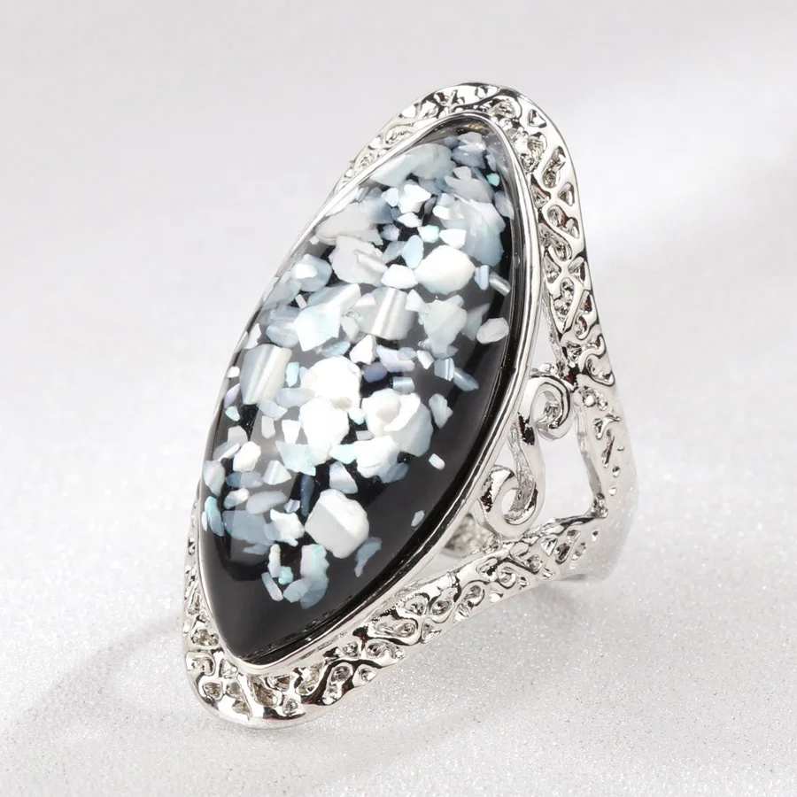 
Wholesale retro magic color shell ring alloy ancient silver carved big ring couple models 