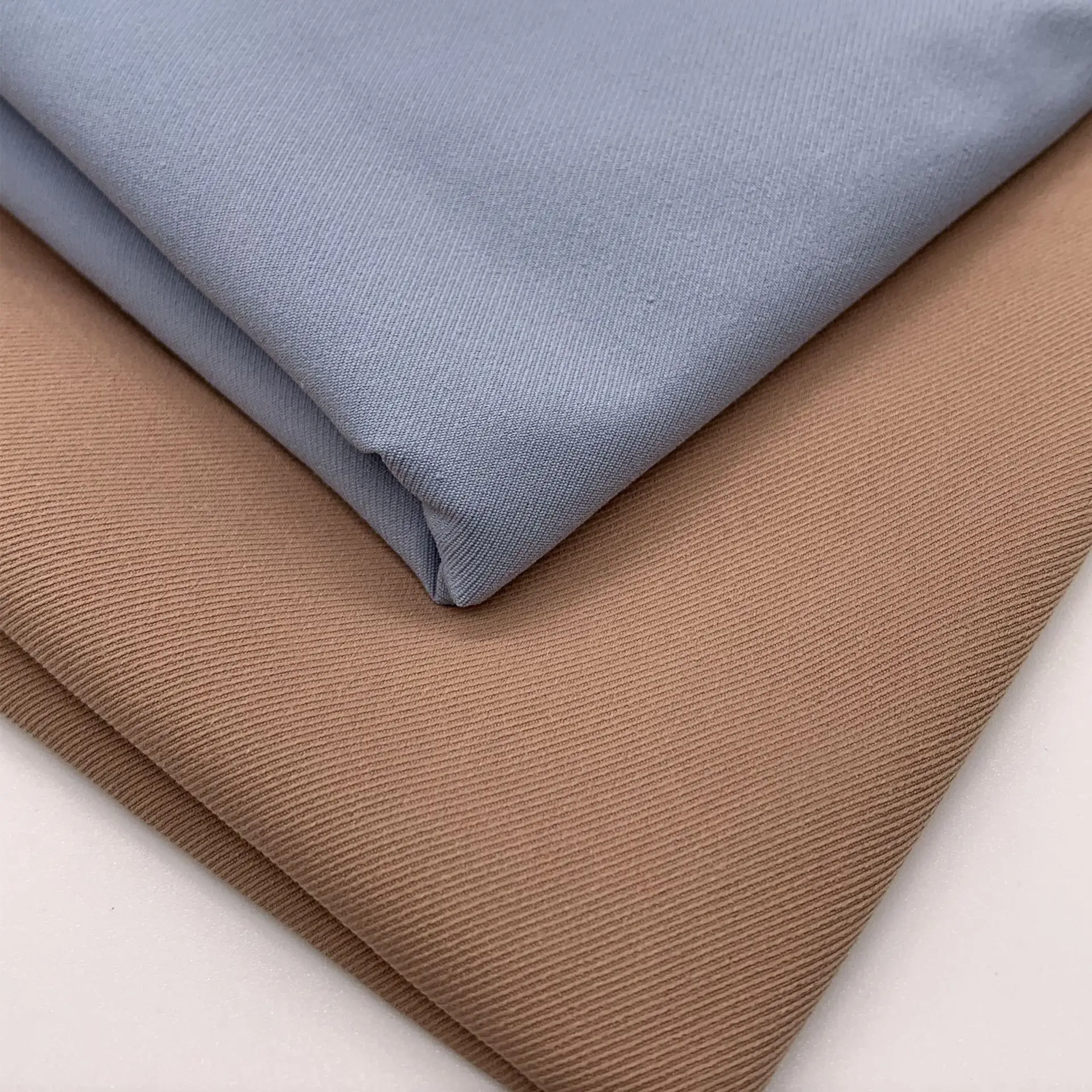 high quality In stock 100%polyester 40S*75D woven cavalry twill cool silk cotton fabric 160gsm for fashion jacket, coat