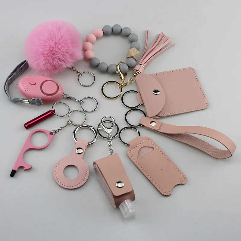 Selling in bulk self-defense DIY11 sets with personal alarm female keychain set self-defense key chain