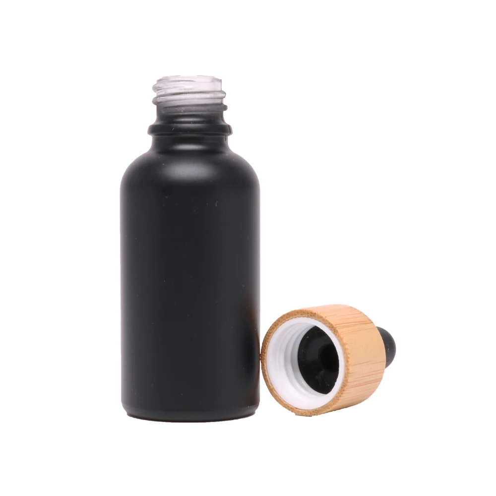 black 30ml glass essential oil bottle with bamboo lid dropper