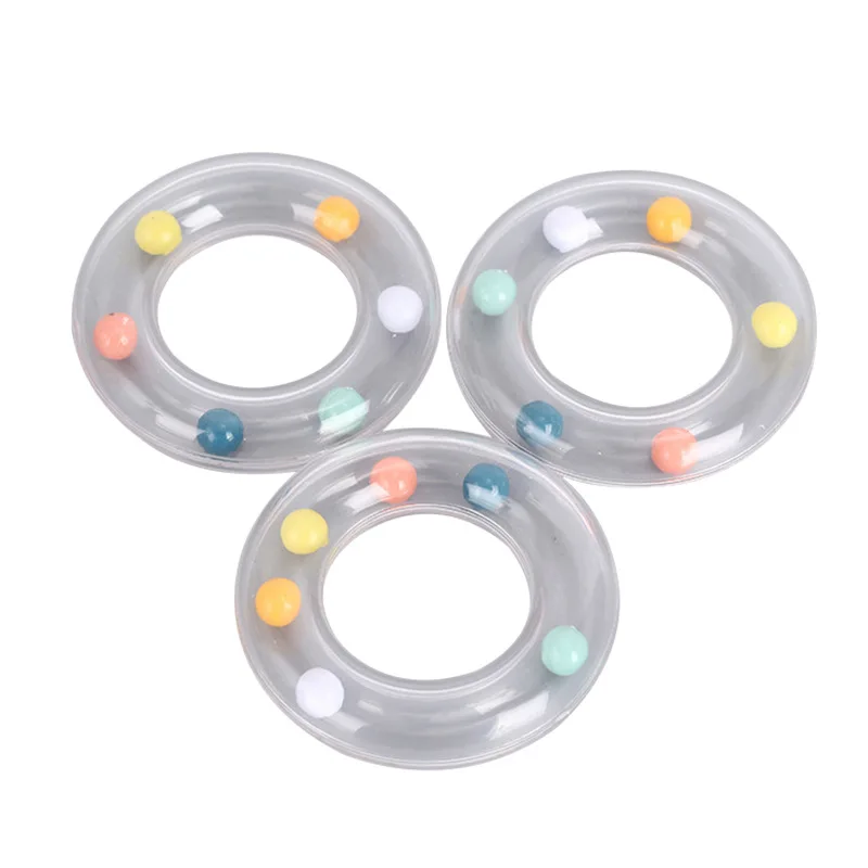 Hot Sell Educational Plastic Lovely Round Transparent Training Ring Baby Bebe Rattle Shake Toys Accessory Bracelet Noise Maker