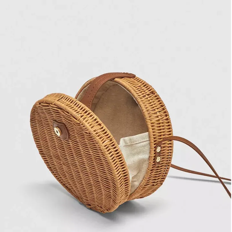 High quality portable lightweight cheap round summer rattan bag indonesia