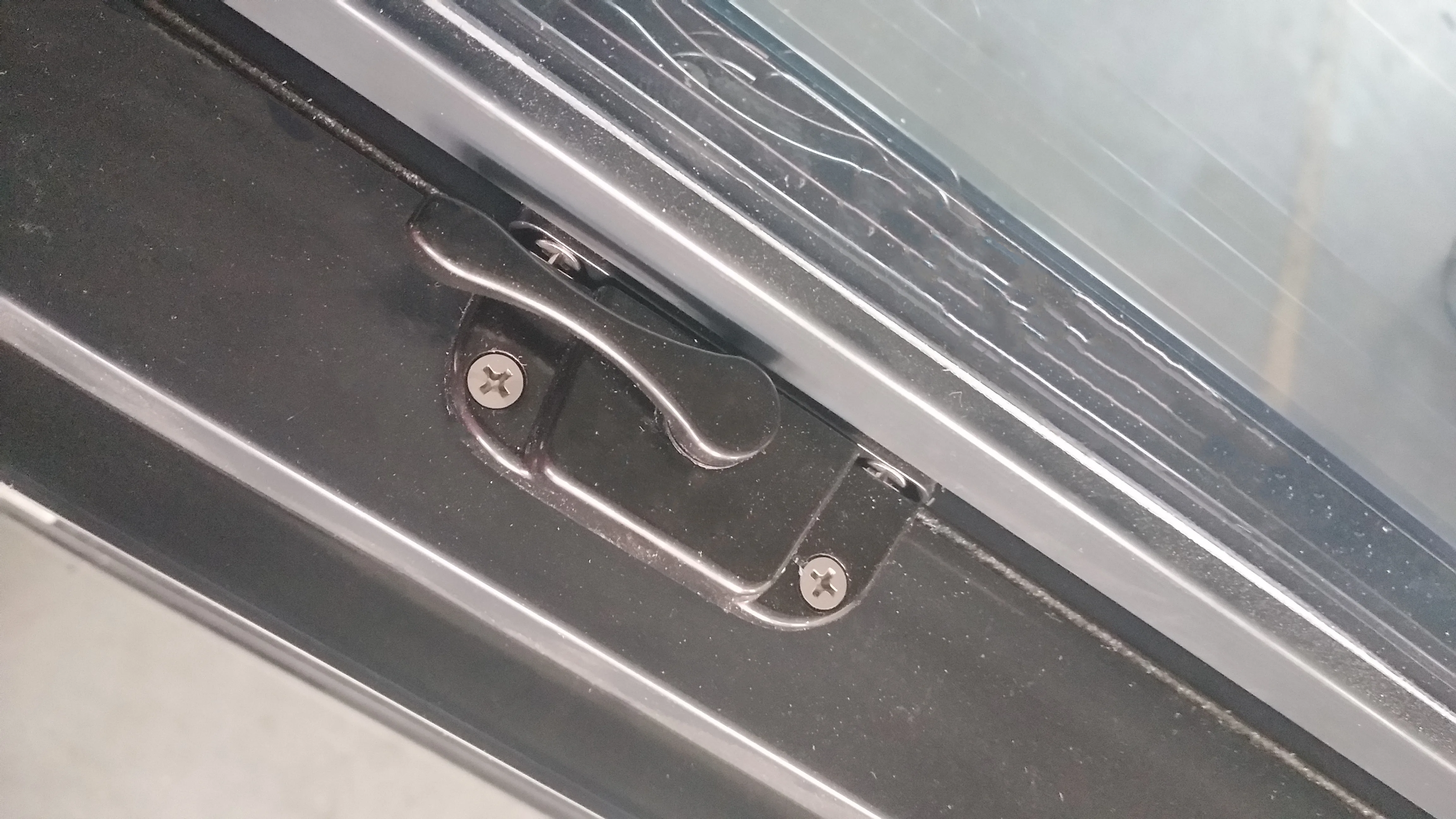 Black vinyl hung window with nail fin girds and  NFRC certification
