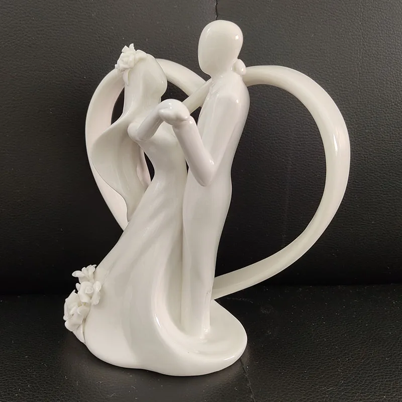 
Ywbeyond Wholesale Ceramic Dancing Bride and Groom Couple Heart Figurine Cake Topper wedding Table decoration 