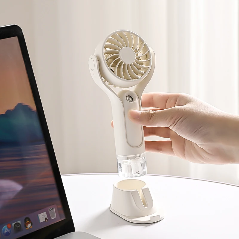 2024 new summer portable mini handheld fan USB rechargeable phone stand humidifier  cooling personal 120 degree small mist fan