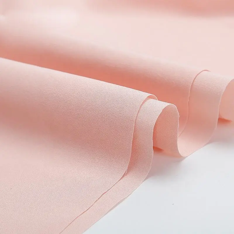 Shaoxing yuyuan imp nslycra wholesale custom high quality woven plain sports pants fabric rolls nslycra four way stretch fabric