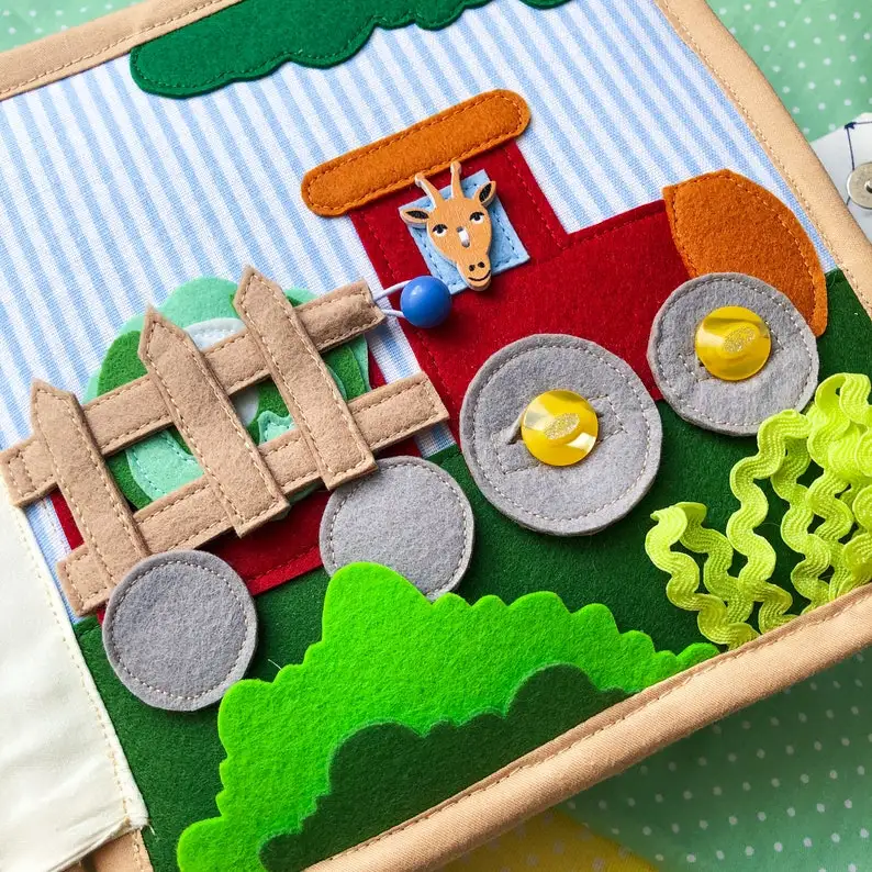 Professional manufacturing in soft baby activity binding silk quiet cloth book education memory for Children