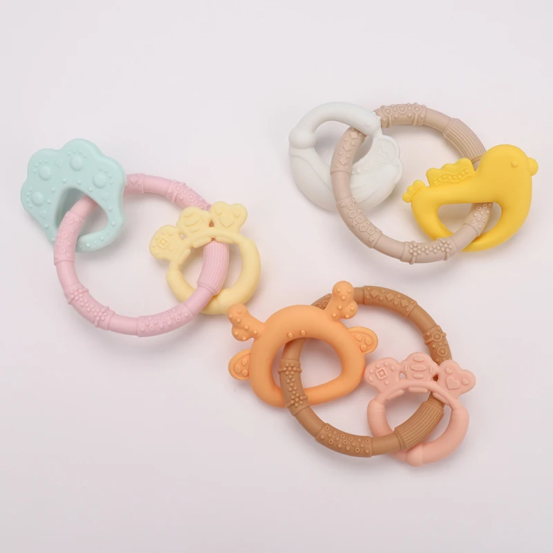 JWX Custom Silicone Chewable Toys New Eco-friendly Autism Sensory Rings Soft Silicone Teething Toys Baby Teether Toy For Infant