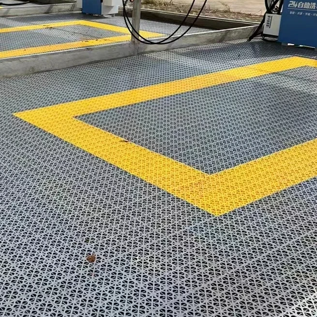 High tensile strength portable plastic garage flooring tiles modular anti slip PP floor mat drain grate for car wash room shop