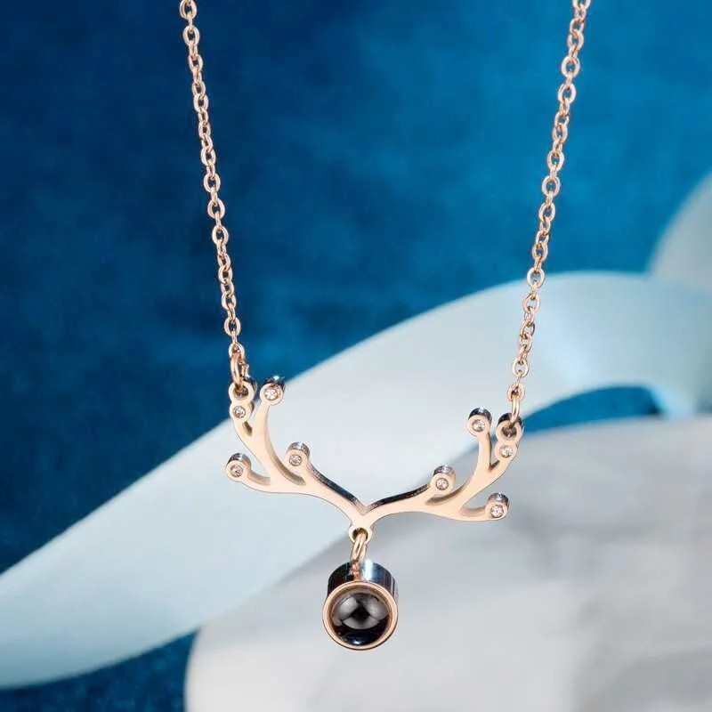 
2021 New One Deer I love You Titanium Steel Necklace Female Rose Gold Smart Deer Love Gift 100 Languages Jewelry 
