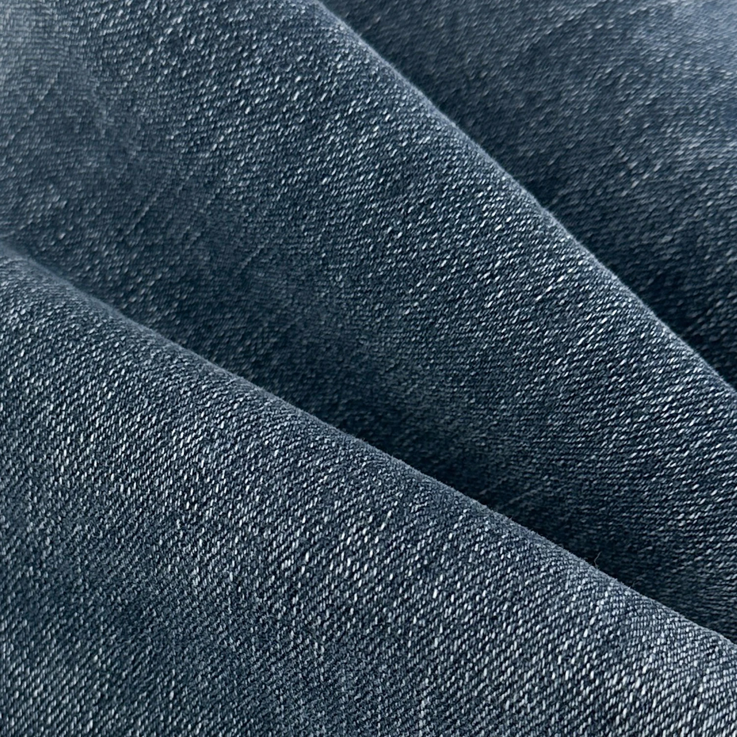 China stock 10s jeans fabric TR mid-spandex denim fabric straight slub jeans fabric for clothes manufacturers with wholesale