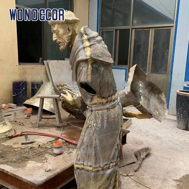Customize life sized bronze statues of modern religious figures such as Saint Francis and a small bird