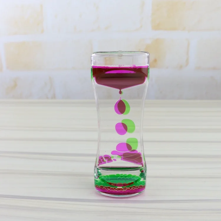 Wholesale Desk Liquid Motion Spiral Toy Acrylic Liquid Timer With Glass Hourglass Floater