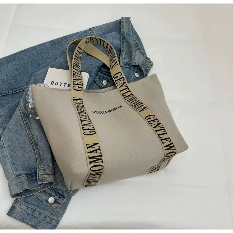 STOCK 44*18*29cm Wholesale  laminated stylish modern organizer large high quality canvas packaging bags women with custom logo