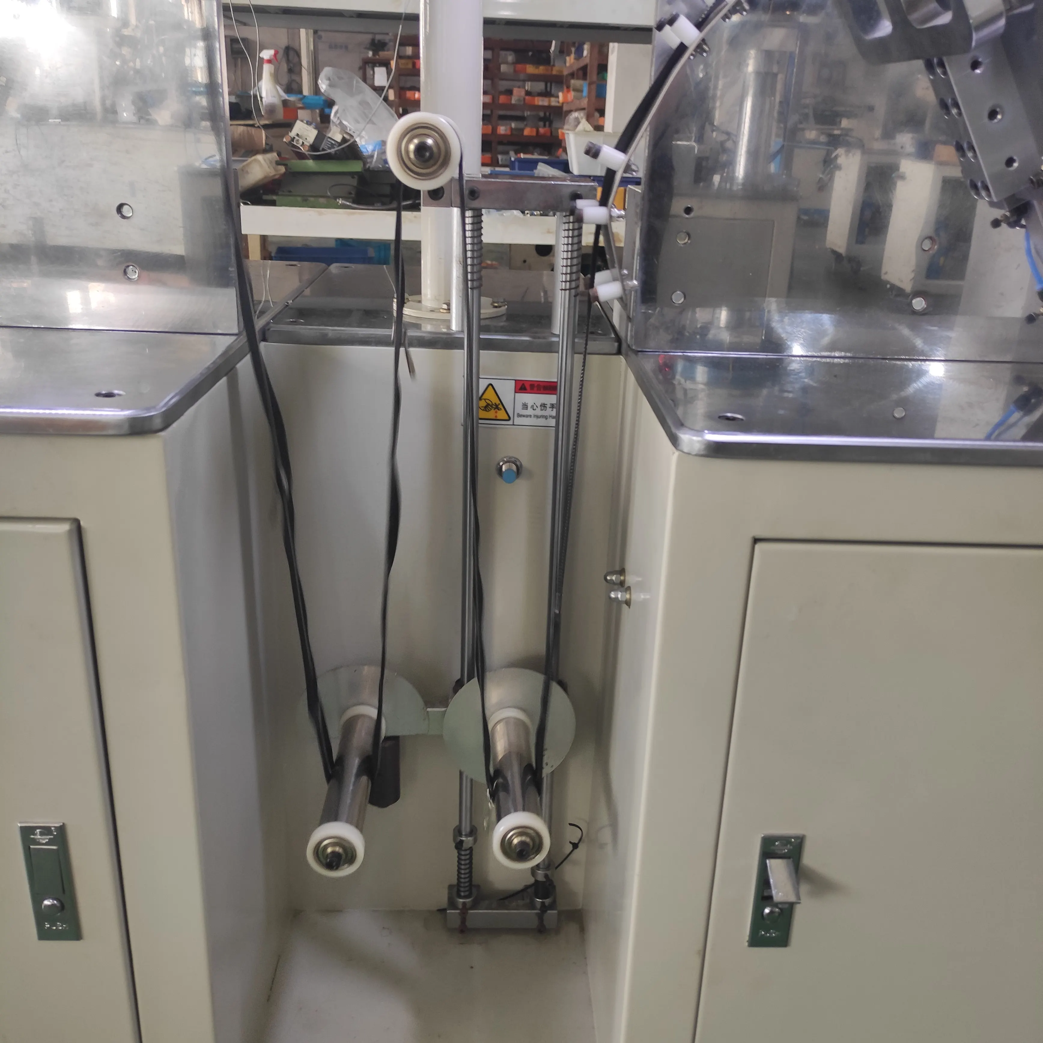 Fully automatic double-opening piercer machine for nylon zipper