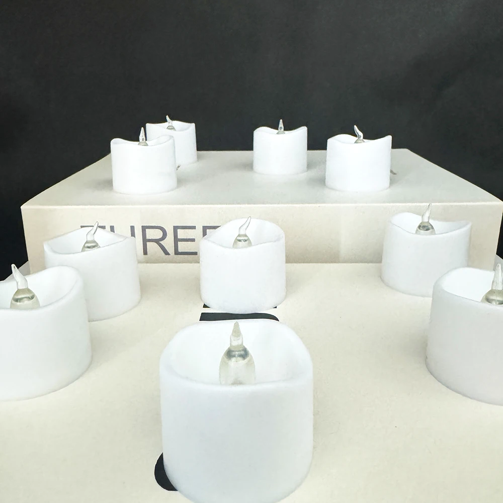 Wholesale home decor white battery operated  tea light candles LED flameless flickering tea lights candles 24-Pack