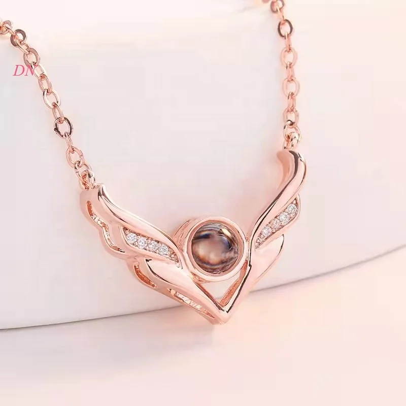 Dina Wholesale Women Jewelry Fashion Angel Wings Necklace With 100 Languages I Love You Projection Necklace FOr Lovers Gifts