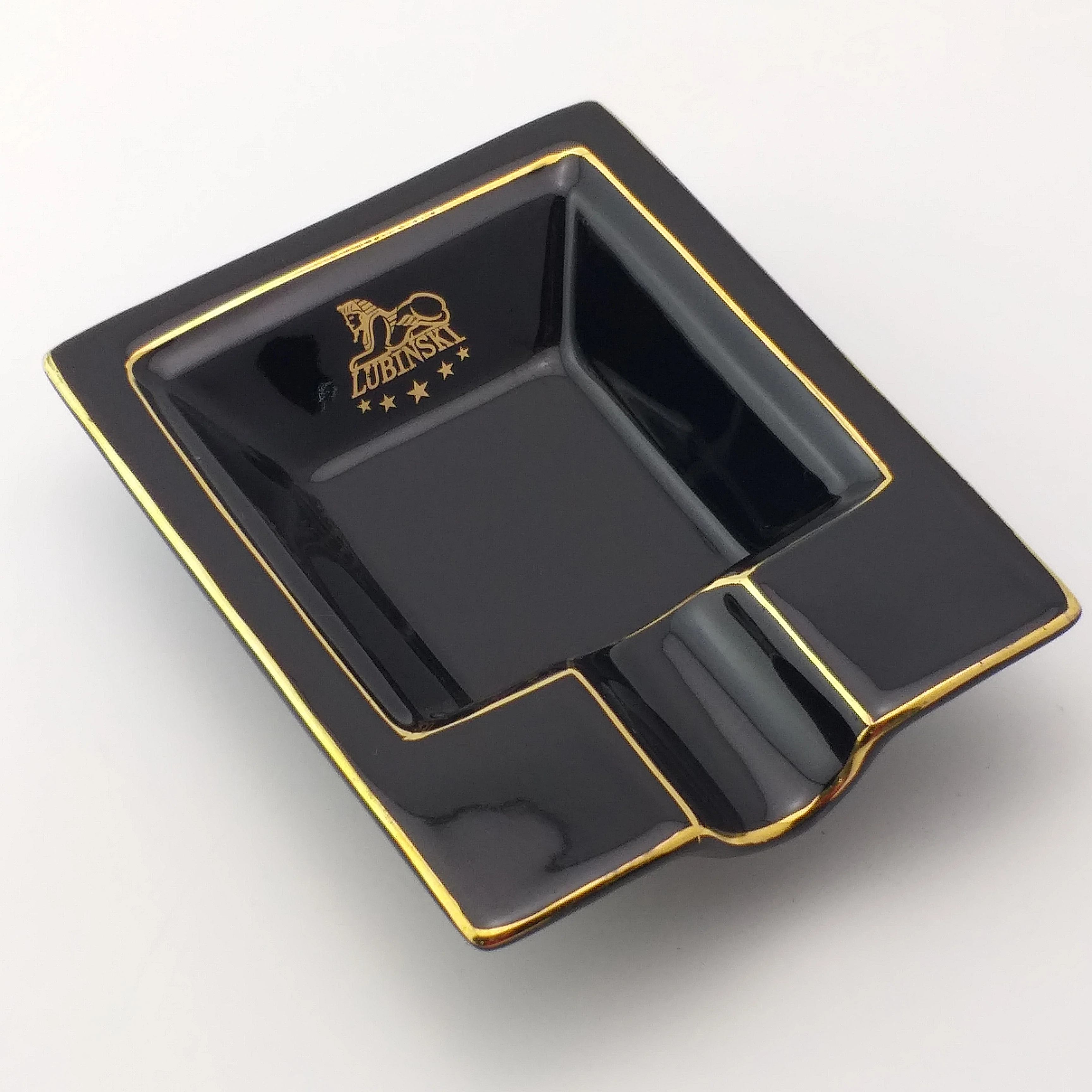 
Best selling black ceramic ashtray with golden edge with one rest with customized logo for sale 
