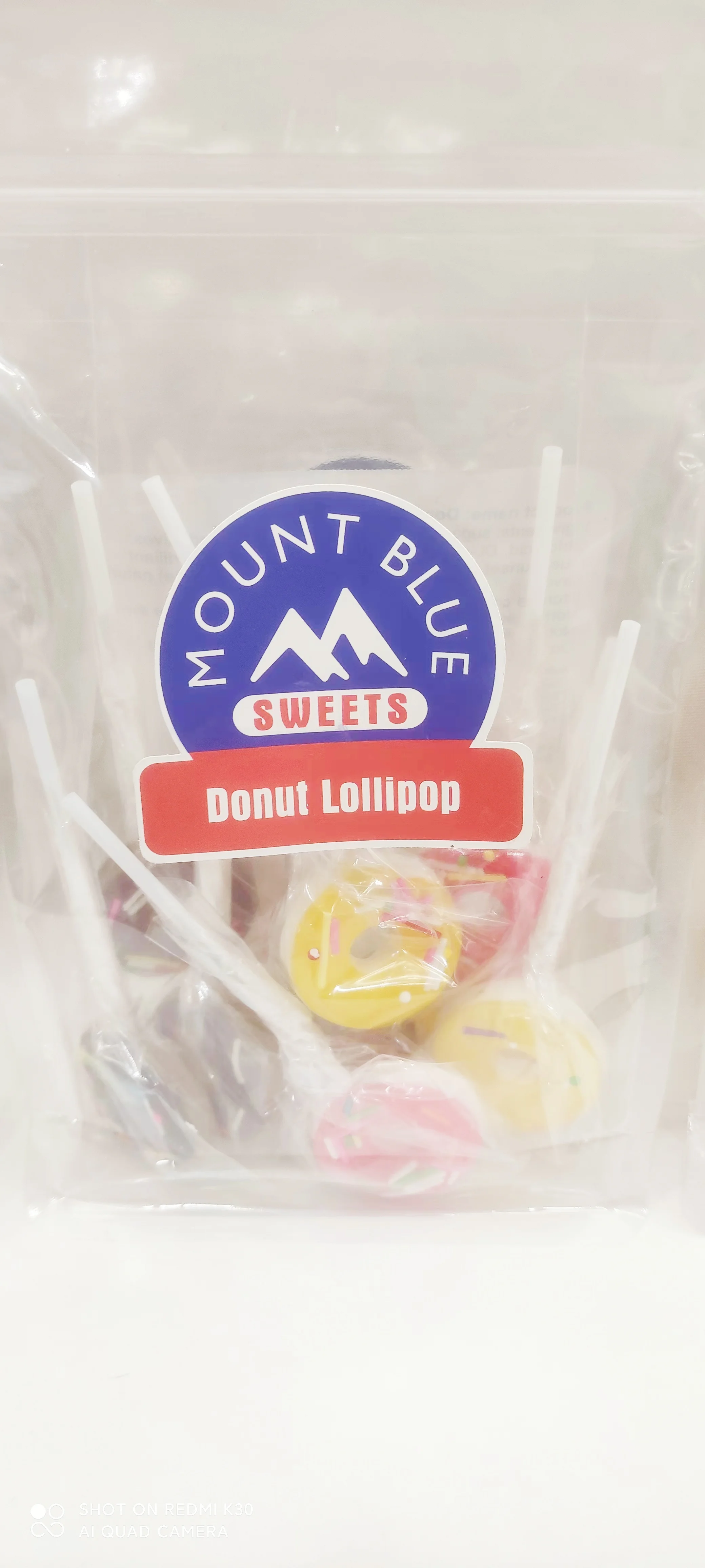 Wholesale round Fruit-Flavored Donut Lollipops for Kids Sweet and Fruity Treat Packaged in a Box