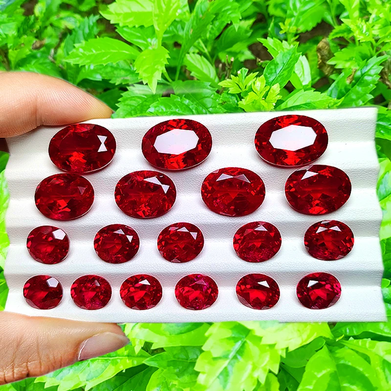 Oval shape natural cut red color synthetic ruby corundum including  minor cracks and inclusions lab created ruby loose stone