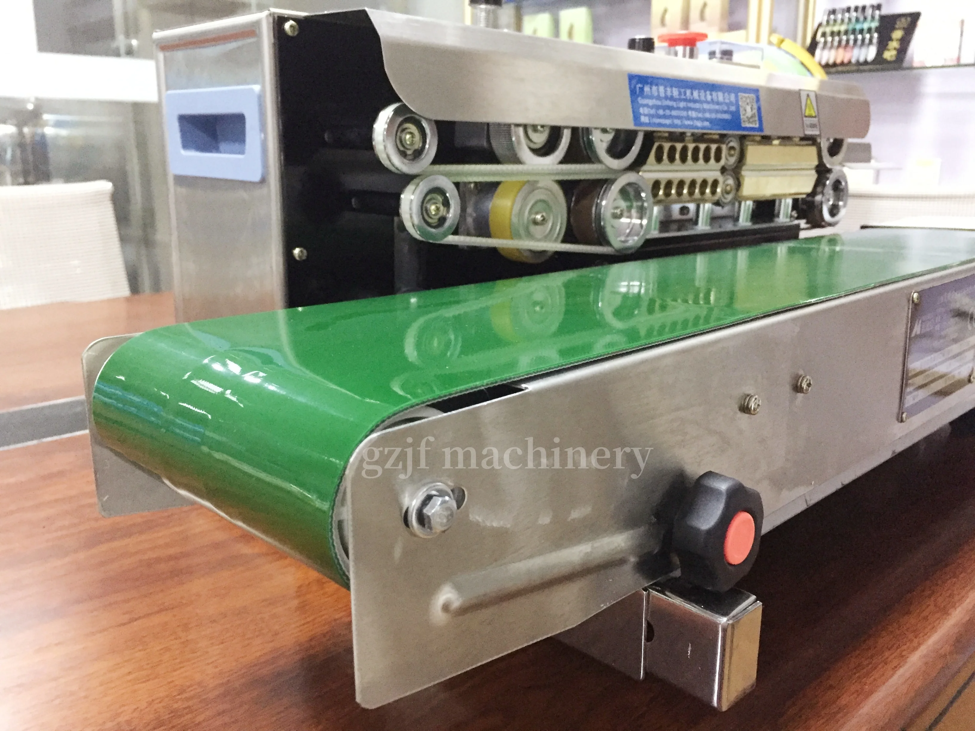 Jinfeng Plastic Bag Band Sealer Sealing Machine Food Snack bag Sealing Machine with inkjet printer plastic heat seal machine