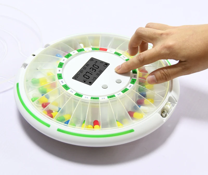Plastic slide pill dispenser with voice alarm 28 compartment for elderly
