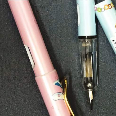 Sanrio Laurel Dog Erasable pen Metal pen holder Bookmark Big eared Dog student EF  Practice Pen Prize