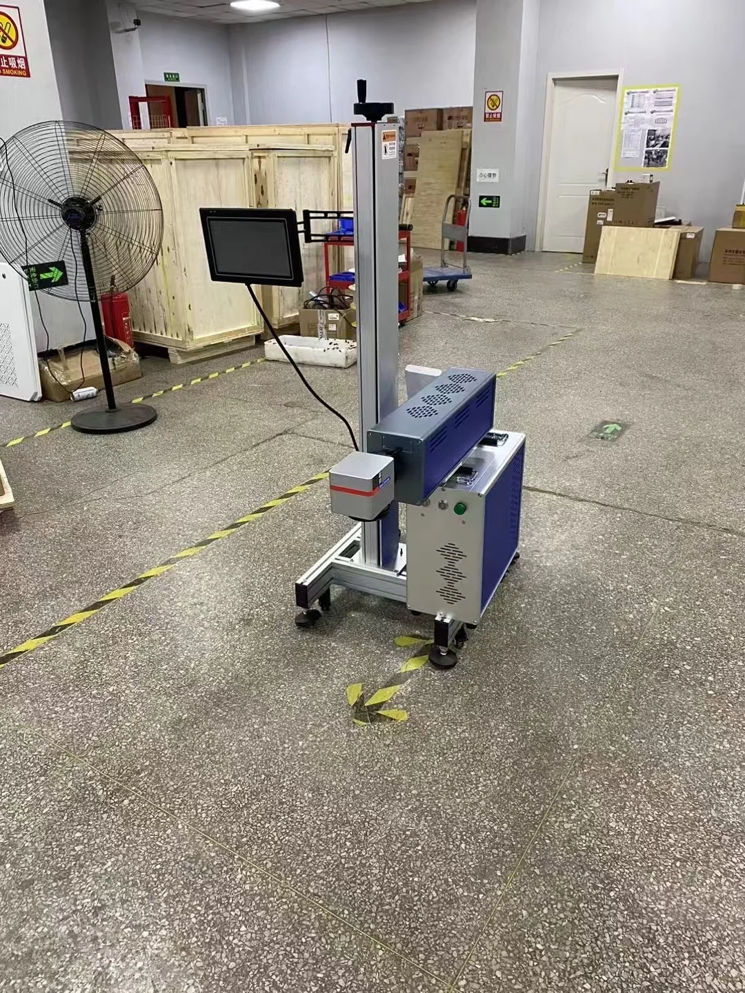 Best price co2 flying laser marking machine from China Industrial Laser printing machine