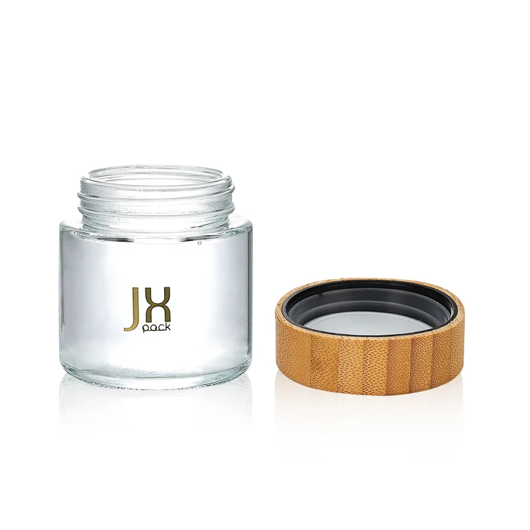 High end 1 2 3 4 oz empty round shape spice storage childproof food container clear honey glass jar with wooden lid