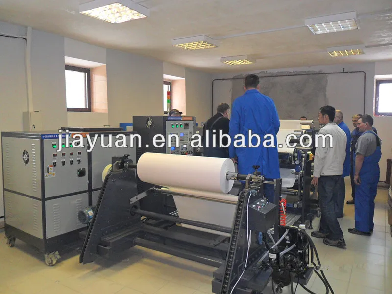 Porous elastic adhesive bandage coating machine