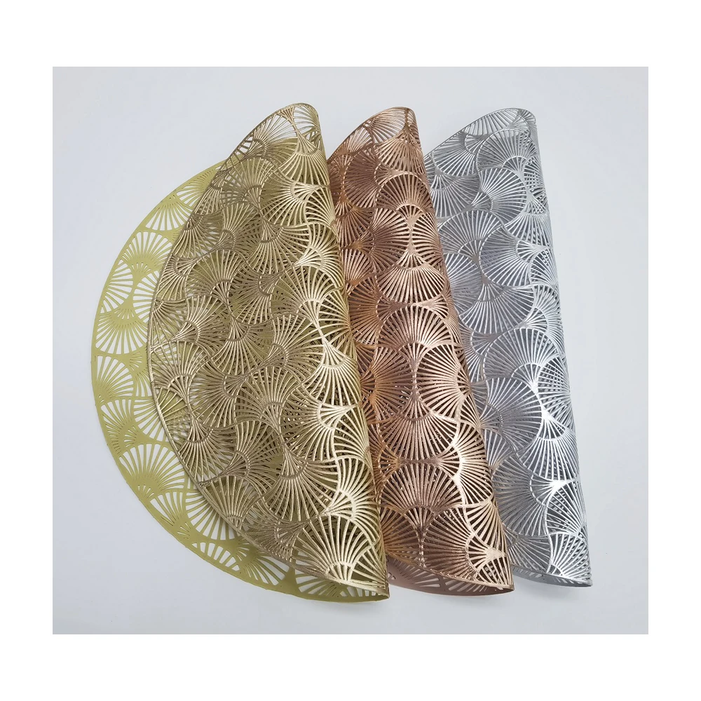Best Selling Solid Color Nordic Round Ginkgo leaves design Non Slip Gold Placemat Pvc table mat Hollow Hot Stamping Placemat